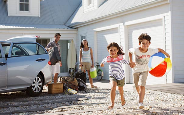 family at beach vacation home