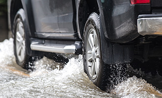 car in puddle